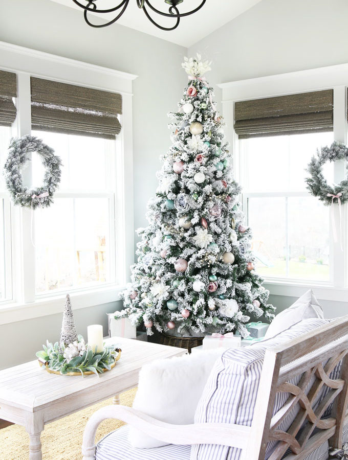 Flocked Christmas Tree in Sunroom with Pastel Ornaments