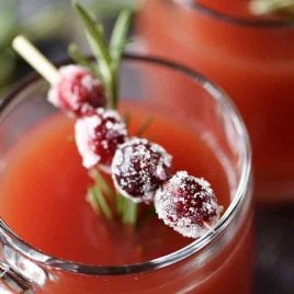 Warm Cranberry Pomegranate Cider Recipe - This quick and easy warm cranberry pomegranate cider recipe makes the perfect sip to stay warm and cozy! // addapinch.com