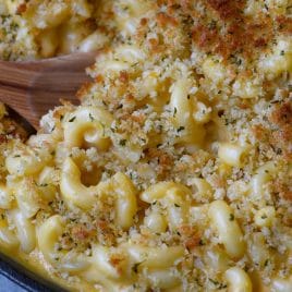 Skillet Mac and Cheese Recipe - Mac and Cheese is the ultimate comfort food! This easy cheesy sauce combined with macaroni and a buttery, crunch topping makes for the creamiest Mac and Cheese! // addapinch.com