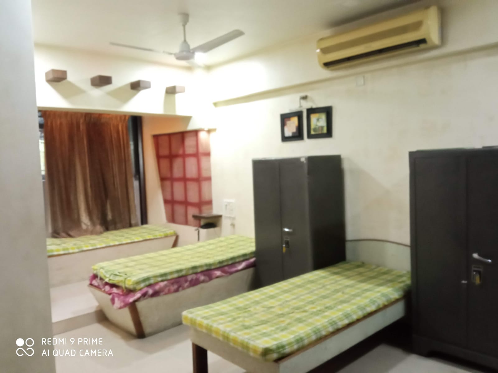 Students talk in bedroom
