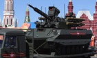An unmanned combat ground vehicle Uran-9 is carried by a truck during the Victory Day military parade to celebrate 73 years since the end of WWII and the defeat of Nazi Germany, in Moscow, Russia, Wednesday, May 9, 2018.