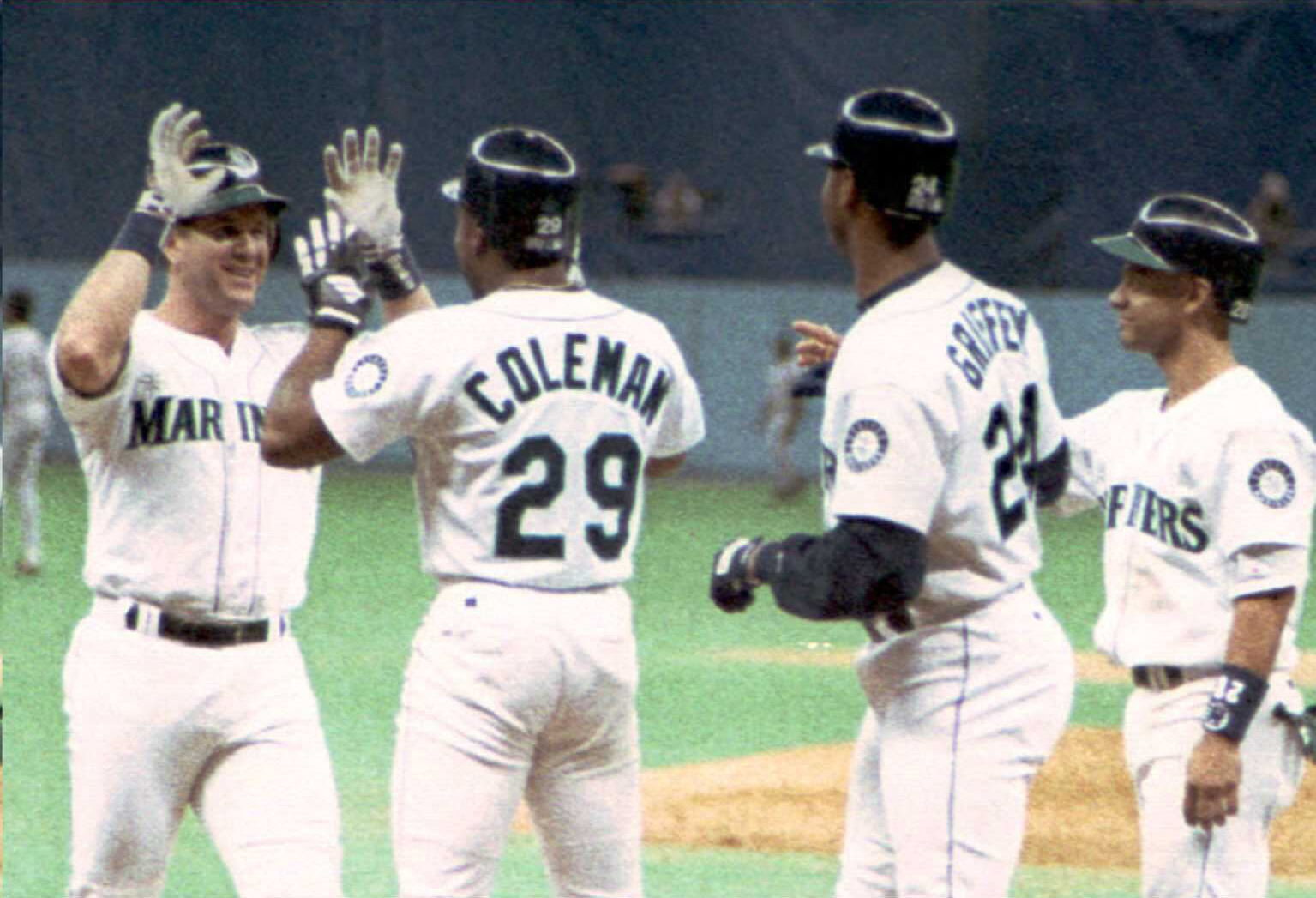Edgar Martinez of the Seattle Mariners (L) is gree