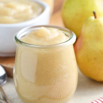 Pear sauce in a glass jar.