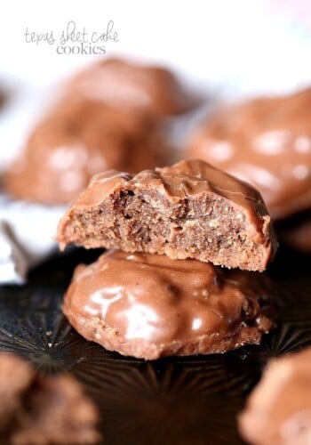 Texas Sheet Cake Cookies. A totally FUN spin on the classic dessert! A dense fudgy cookie topped with the classic poured chocolate icing. You'll LOVE these!