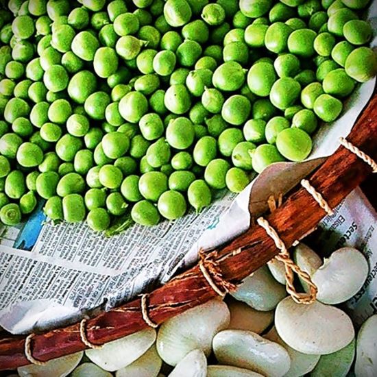 Peas and lima beans in bright woven basket