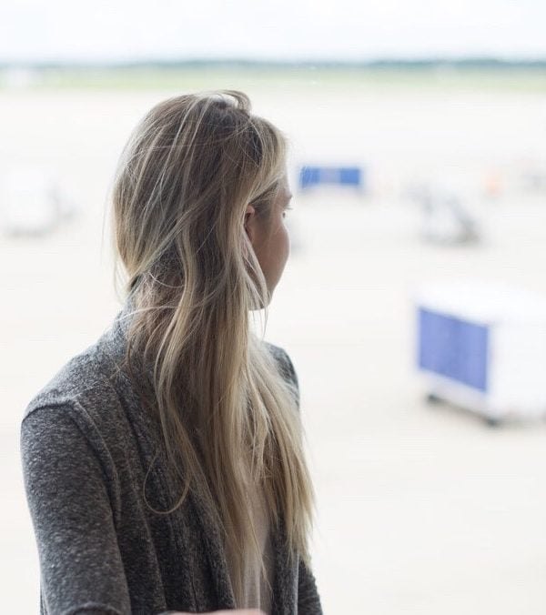 woman at airport window