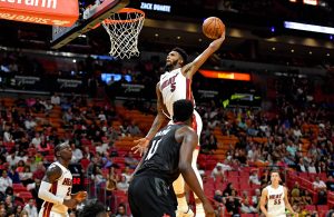 Derrick Jones Jr. and Clint Capela