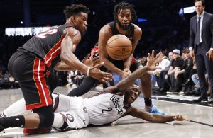 Jimmy Butler, Justise Winslow and Taurean Prince