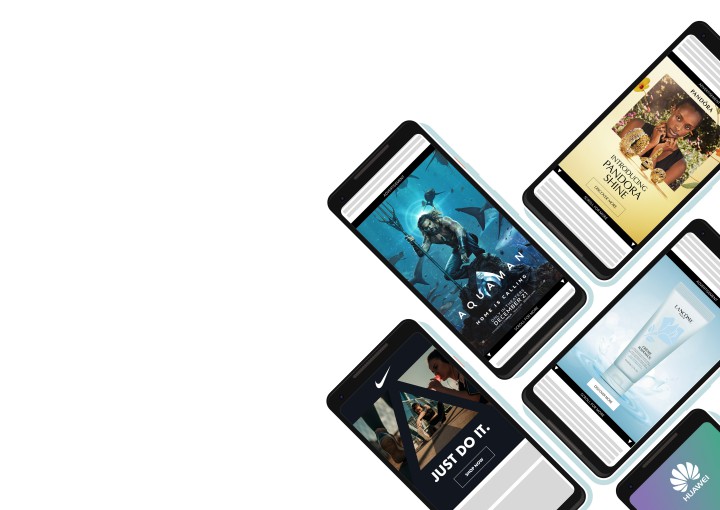 A composition of different phones on an isometric grid showing the different parts of JustPremium's new Mobile Skin ad format