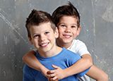 The Coolest Boys Haircuts To Stand Out At School: Ideas & Styling Tips