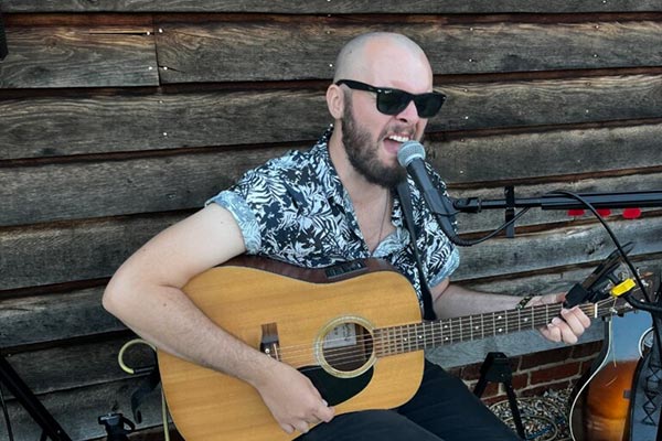 Toast Live acoustic guitarist and singer