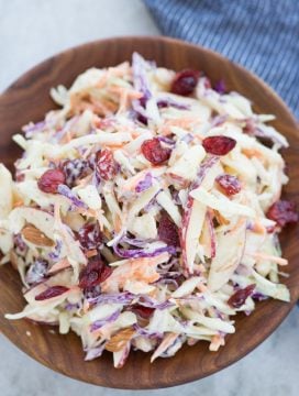 Crunchy apples, Cabbage, carrot, Tart Cranberries in a creamy dressing, this Apple Coleslaw or Apple Slaw is healthy&nbsp;and easy to make. A perfect side dish to serve and can be made in just 10 minutes.