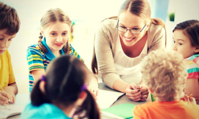 teacher talking with kids
