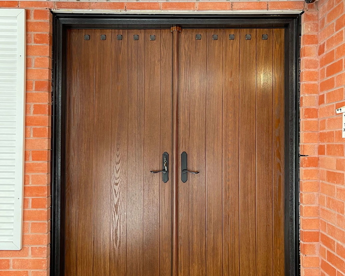 Fiberglass double door with nailheads
