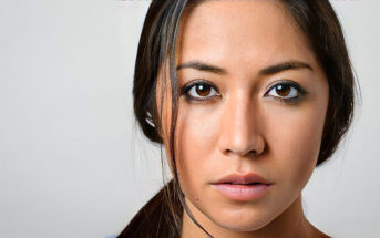 woman with a blank stare on her face illustrating emotional numbness