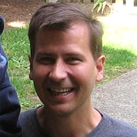 Image with missing alt attribute found on coinigy.com