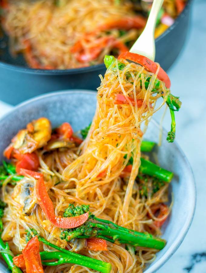 Taking a fork full of the ready dish.