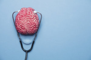 A new analysis identifies key areas where mental health issues are on the rise--and offers suggestions to help students feel supported, like this brain and stethoscope.