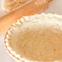 Baked pie crust with rolling pin