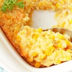 Close up of corn pudding in a glass dish