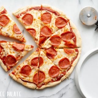 My go-to Gluten-Free Pizza Crust recipe is a simple staple for your Gluten-Free kitchen, and one of the best gluten-free pizza recipes out there.
