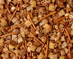 Closeup view of Homemade Chex Mix with pretzels and mixed nuts