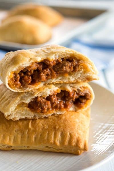 Plate of stacked unsloppy joes with beef filling showing