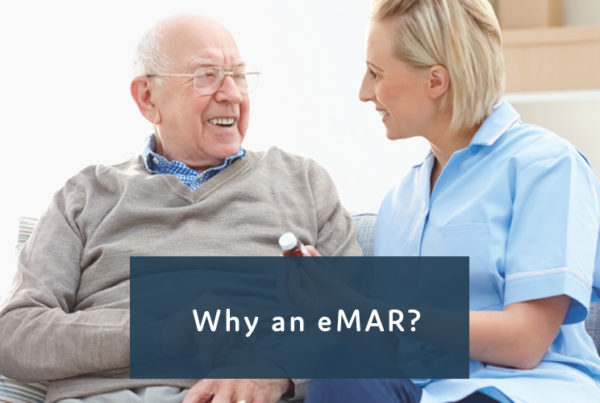 A nurse and assisted living resident sit on couch discussing a medication. e-MARs like QuickMAR free up more time to spend with patients.