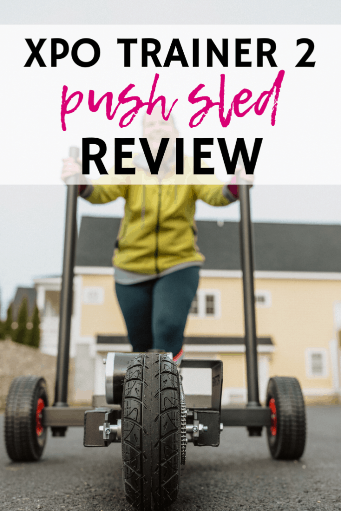 a woman pushing a weight sled with a text overlay that says xpo trainer 2 review