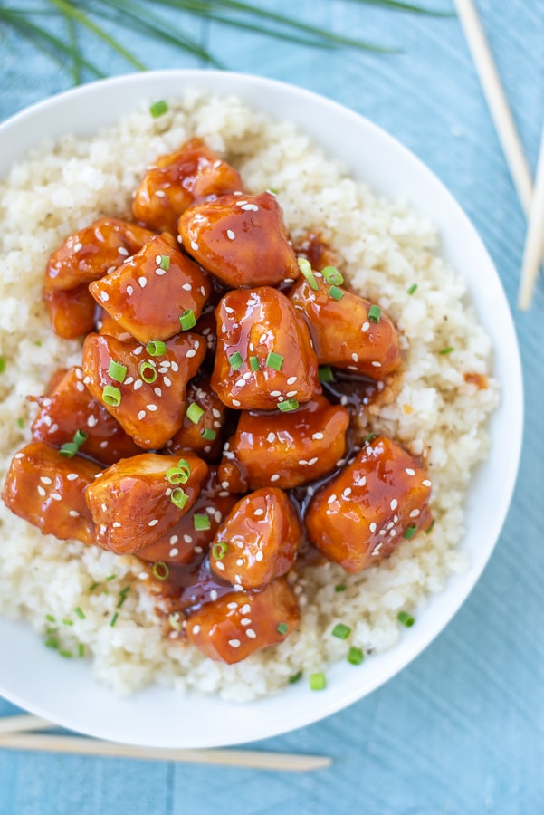 Sweet and spicy Firecracker Chicken served over cauliflower rice.