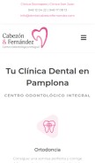 How dentalcabezonfernandez.com looks like on a mobile device such as an iPhone.
