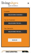 How livingsitges.com looks like on a mobile device such as an iPhone.